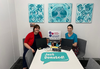 Engagement Officer Danni with Telulah from QDN with some of the doanted digital devices